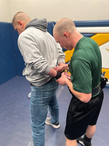 Recruit handcuffs instructor during scenario