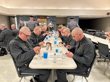 people eating in a cafeteria