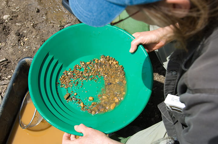 woman panning for gold