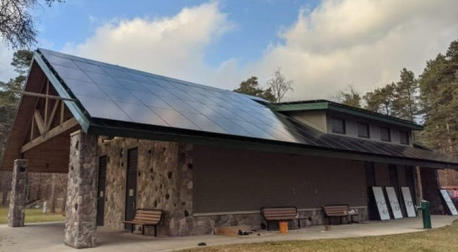 A state building with solar panels covering the roof