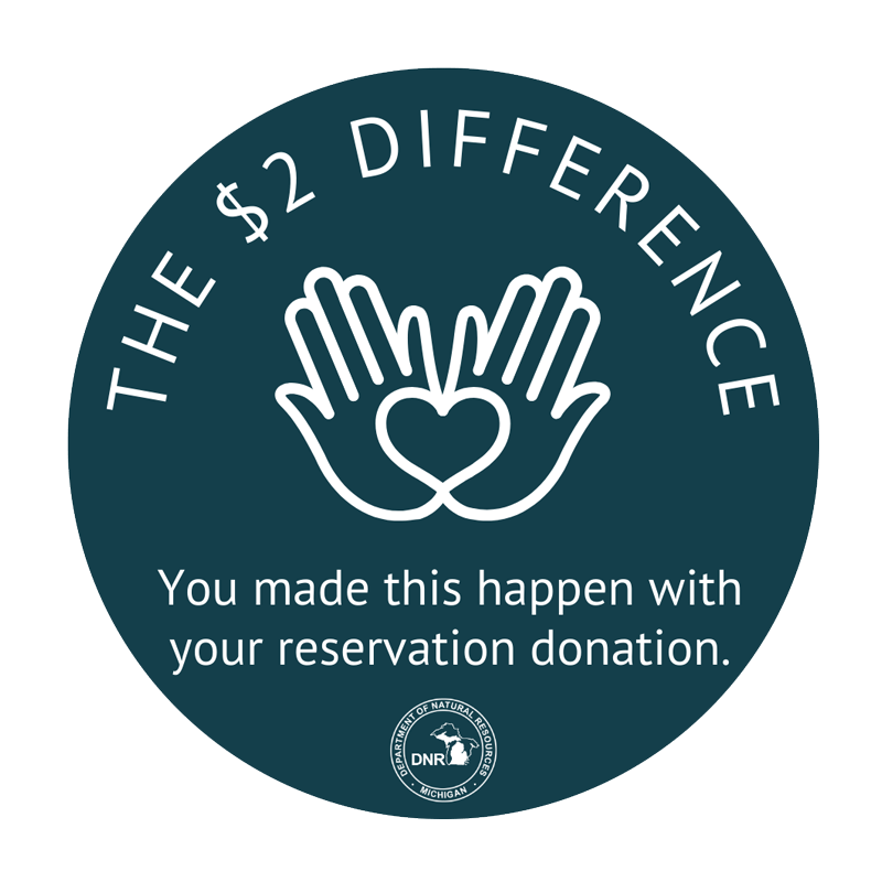 Blue circle with text "you made this happen with your reservation donation"