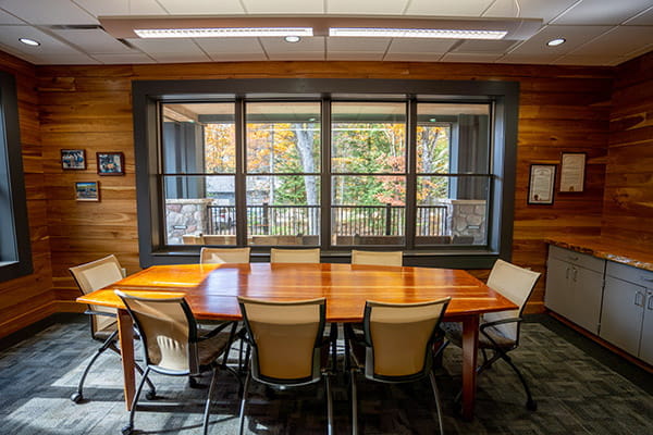Executive table and chairs with windows