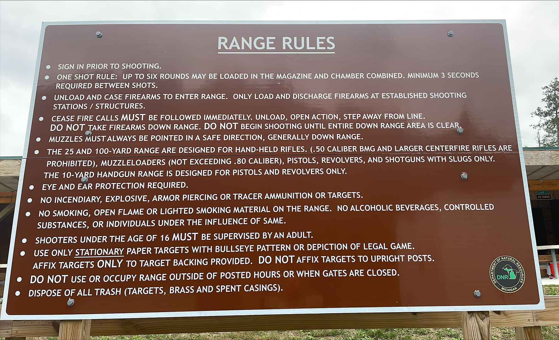 Sign with Lapeer Shooting Range rules