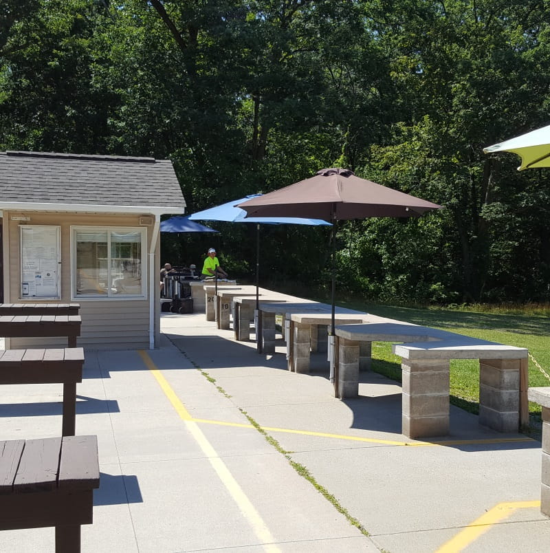 Ortonville shooting range shooting stations with umbrellas for shade