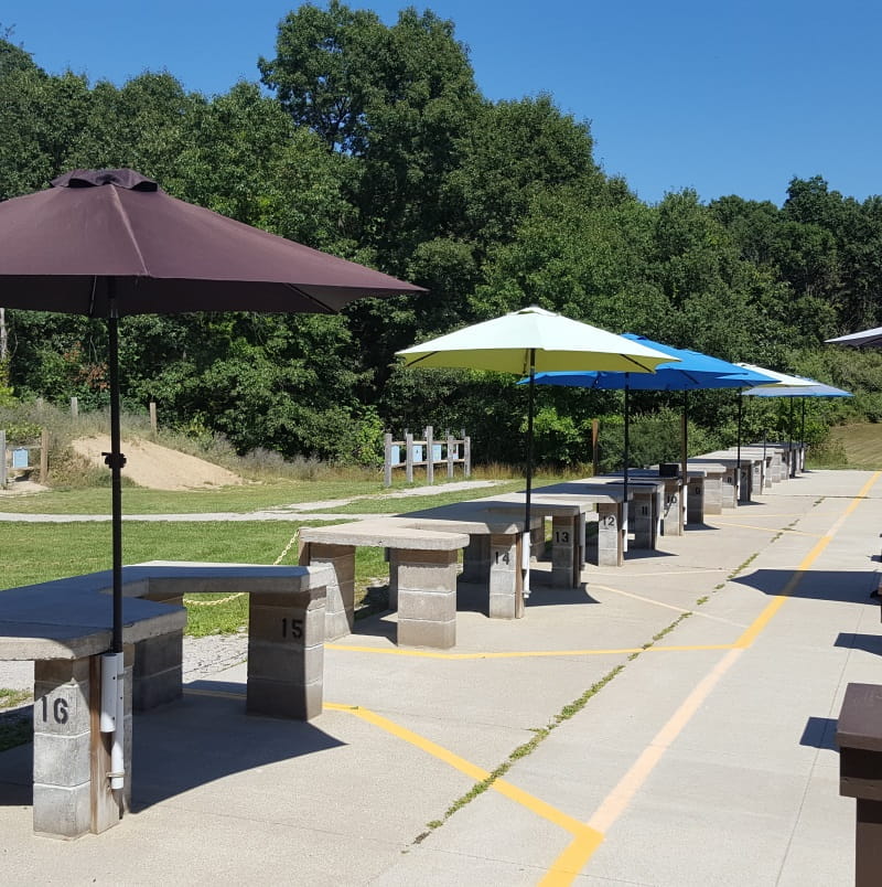 Ortonville shooting range shooting stations with umbrellas for shade