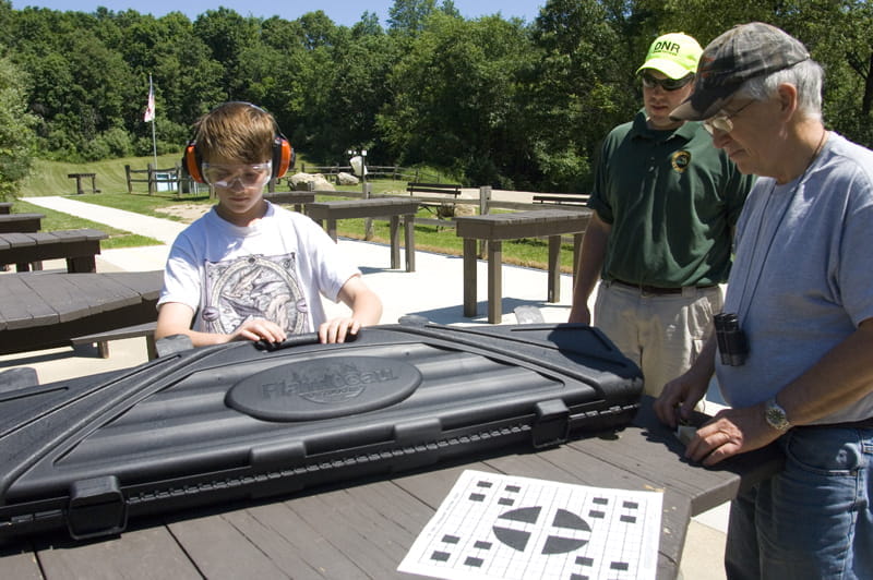 Ortonville Shooting Range - shooters opening gun case