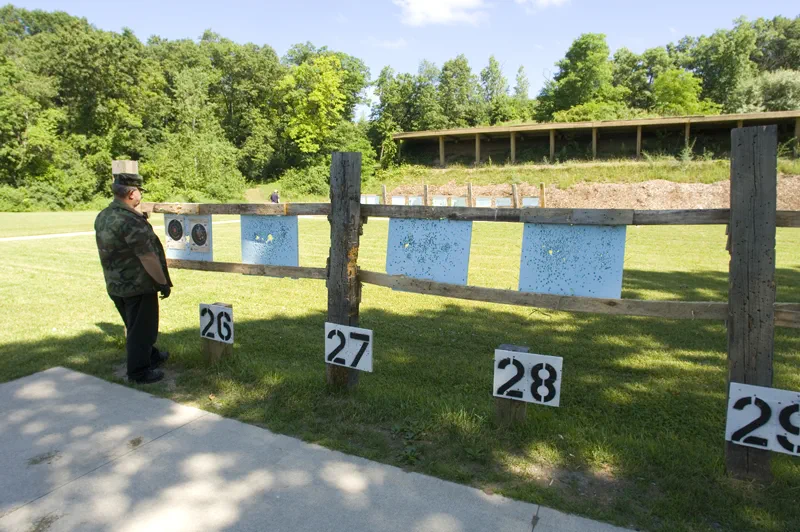 Pontiac Lake Shooting Range - man looking at targets