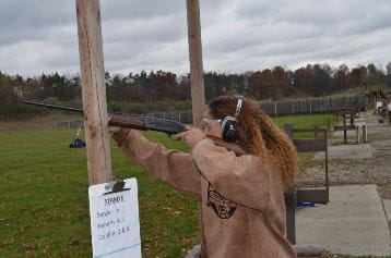Rose Lake Shooting Range - lady shooting at hand trap range