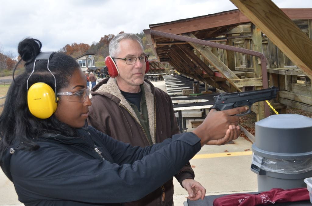 Rose Lake Shooting Range - woman shooting handgun