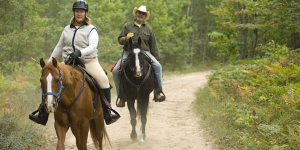 two riders on a trail
