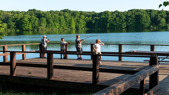 Kids fishing on a pier