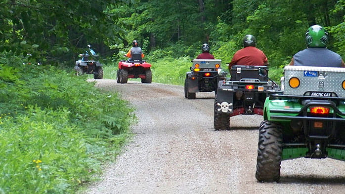 A group of ORV riders on a trail near Baraga State Park