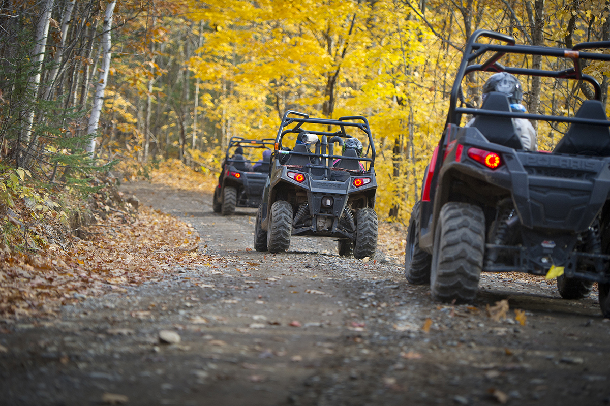Three ORVs on trail