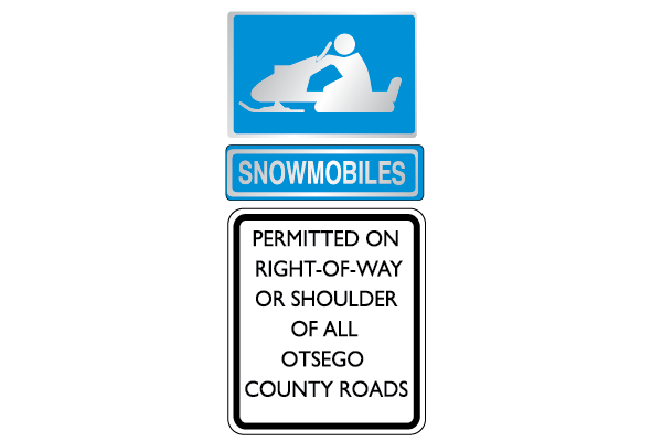 Blue sign with white snowmobile and the word snowmobiles in white text below, with white sign with black text below that saying "permitted on right-of-way or shoulder of all X county roads"