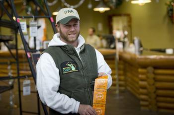 A DNR employee with a purchased hunting license. 