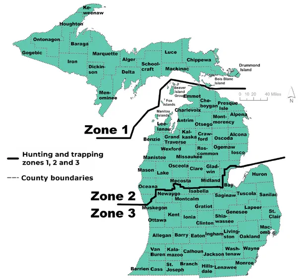 Complex map showing the hunting and trapping zone boundaries for Michigan. Zone 1 includes all of the Upper Peninsula. Zone 2 covers the northern Lower Peninsula and Zone 3 covers the southern Lower Peninsula, divided by a boundary line across the middle of the Lower Peninsula. County boundaries are shown. For assistance call 517-284-9453 or see the wildlife conservation order for a written description of boundaries at Michigan.gov.