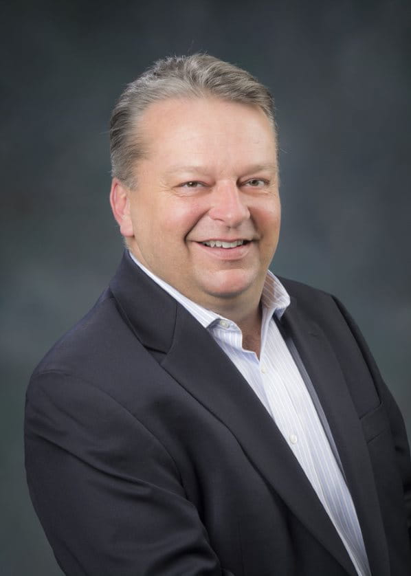 Headshot of Eric Swanson.
