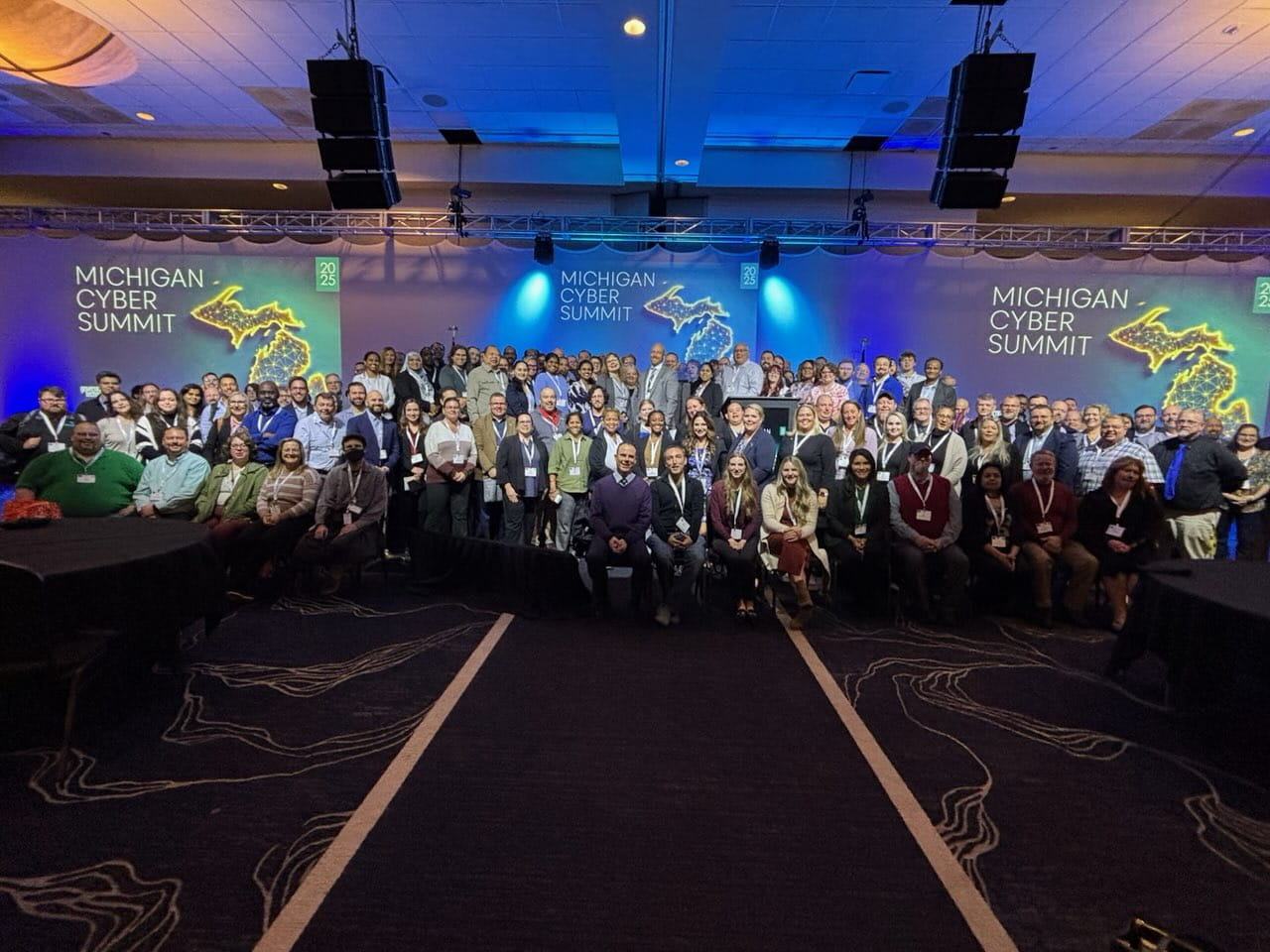 Group of DTMB employees smiling while posing for a photo.