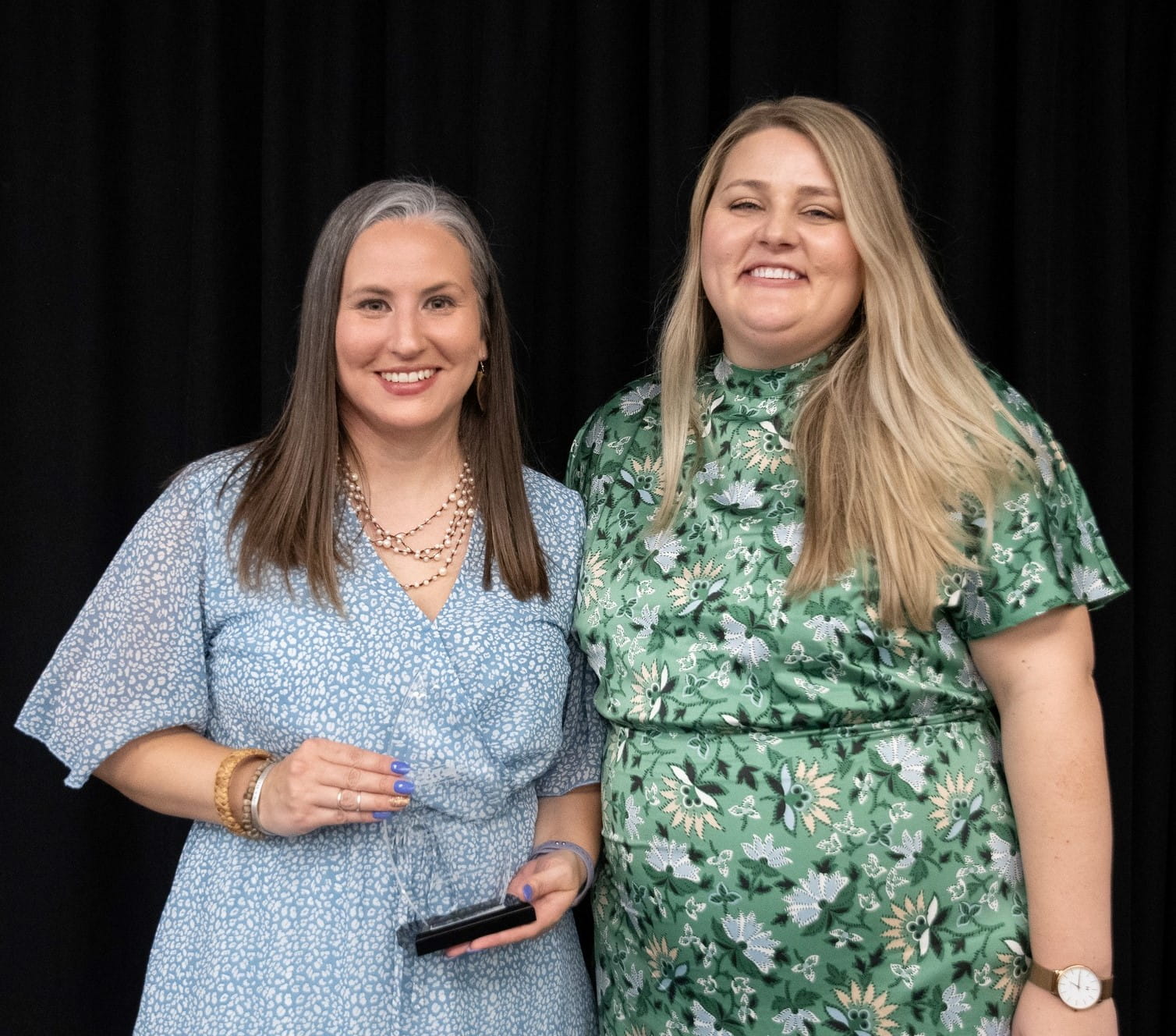 DTMB’s Christyn Herman (left) accepts 2023 PACE Award of Excellence from CMPRSA President Lisa Biering (right), at the May 4 awards ceremony.