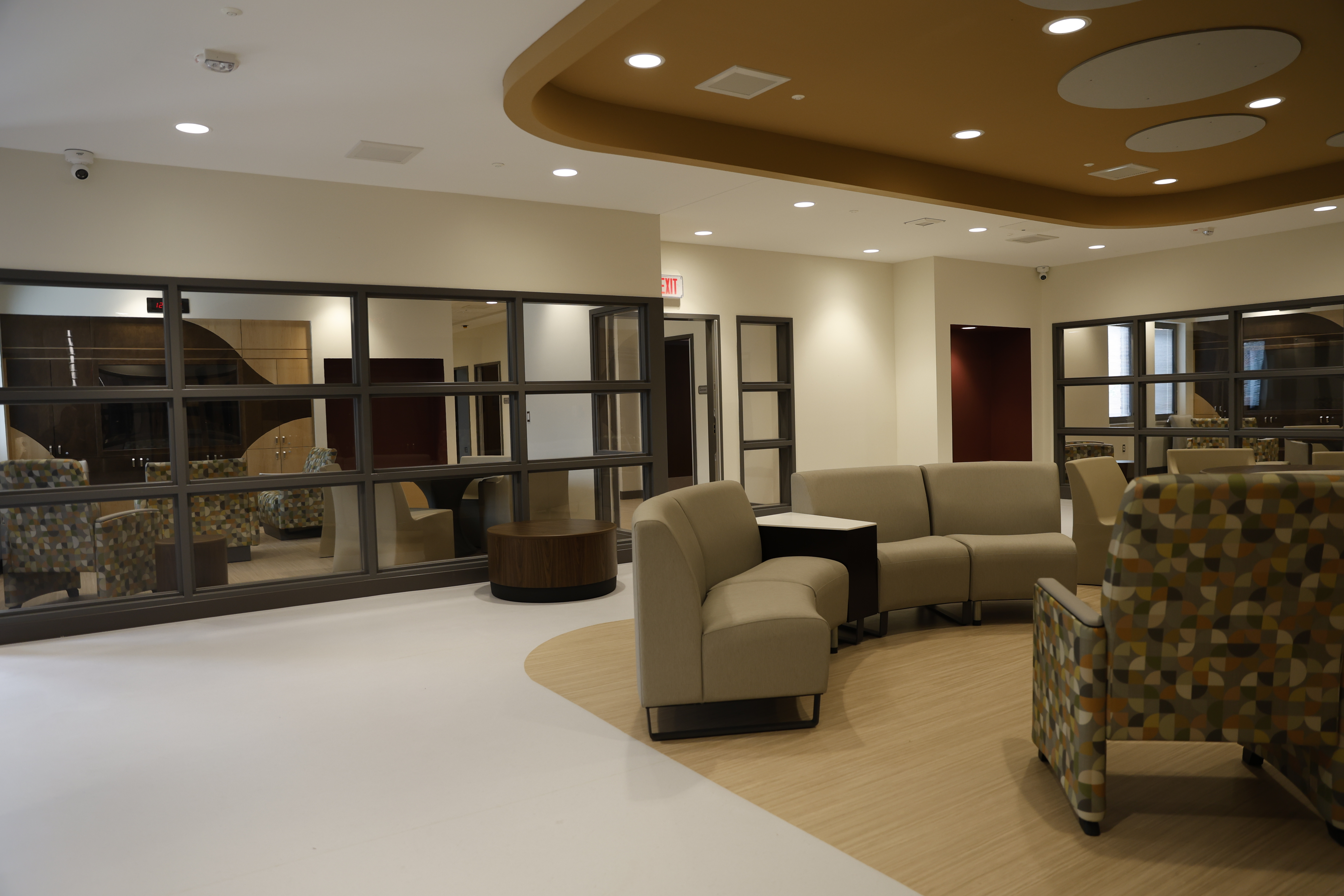 Photo in the Caro Psychiatric Hospital. Lobby area with bench seating.
