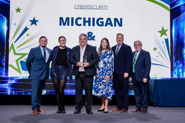 Pictured left to right with the award during an event in San Diego are NASCIO Awards Committee co-chair and CIO of the State of Nevada Timothy Galluzi, NASCIO Awards Committee co-chair and CIO of the Commonwealth of Pennsylvania Bry Pardoe, CIO of the State of Michigan and Director of the Center for Shared Solutions Eric Swanson, Agency Services Director Heather Frick, NASCIO Executive Committee Past President and CIO for the State of Arizona J.R. Sloan, and NASCIO Executive Director Doug Robinson.