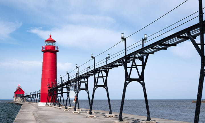 Landscape of the Grand Haven Lighthouse, pier, and catwalk, Lake Michigan, Michigan, USA