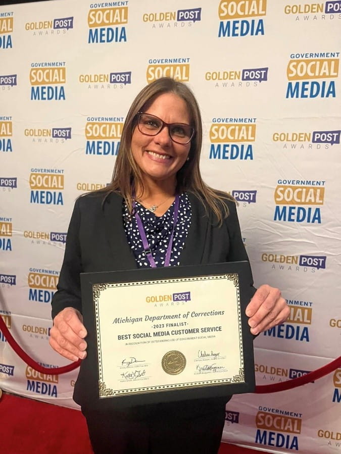 Lisa Gass, communications representative and social media strategist with MDOC, poses with the 2023 Golden Post Finalist certificate at the Government Social Media Conference in Reno-Tahoe, Nevada, May 3.