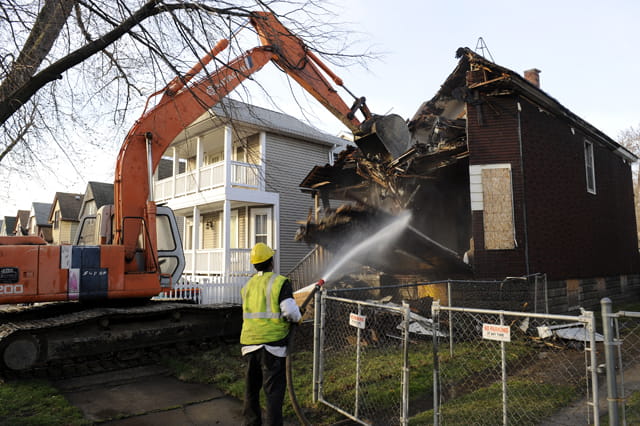 Detroit demolition using water spray.