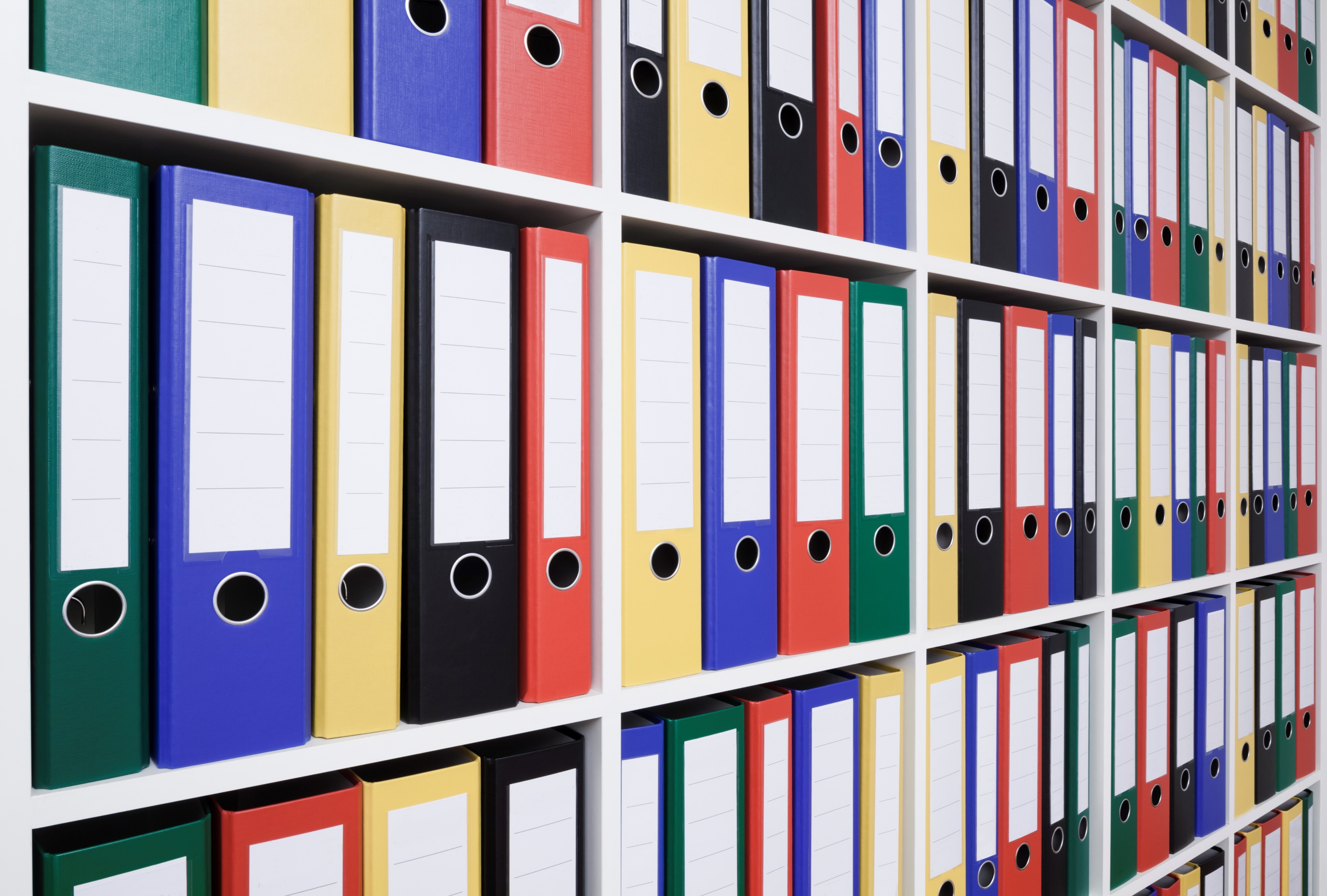 rows of data binders on shelves