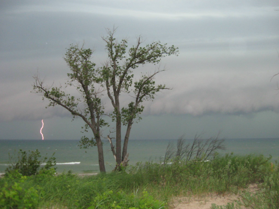 Lightning strike over water in Benona Township