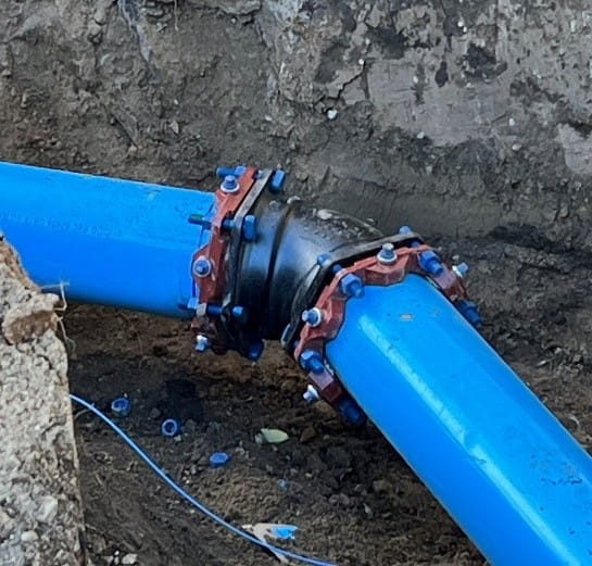 Municipal water distribution system improvements underground.