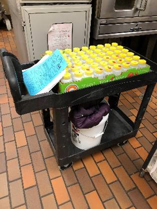 cart with assessment bottles