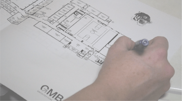 person reviewing a fixture plan