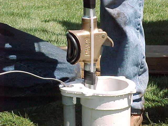 pitless adapter with disinfection tube in well