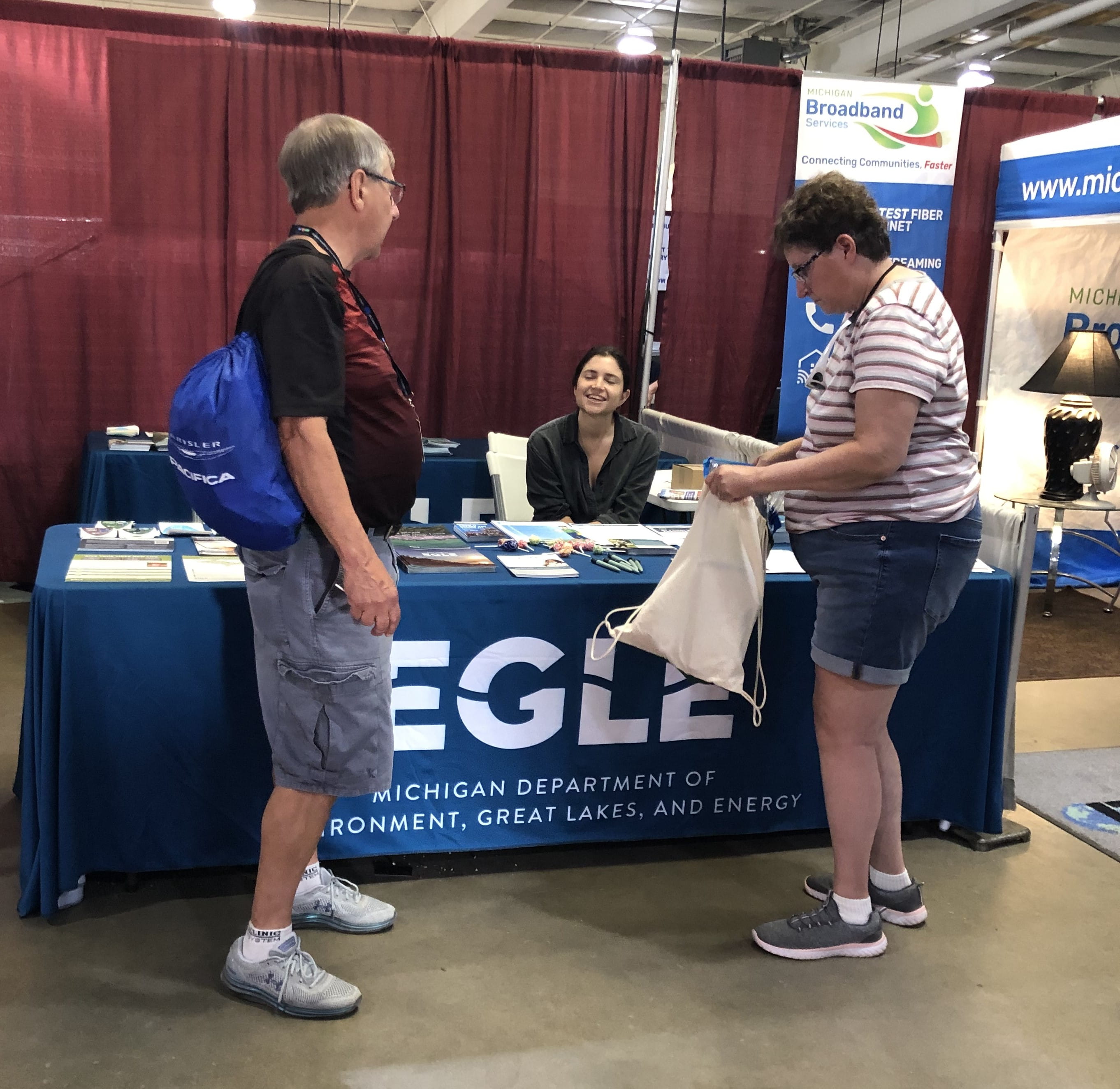 EGLE staffer at EGLE booth at the Upper Peninsula State Fair in 2023.