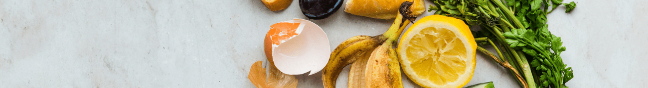 Scattered discarded food including a banana and an egg
