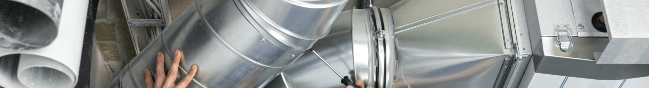 Person fixing a air duct