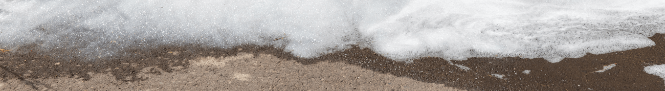 PFAS Foam on the sand