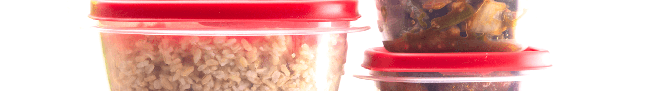 Boxes with Red Lids filled with Leftover Food
