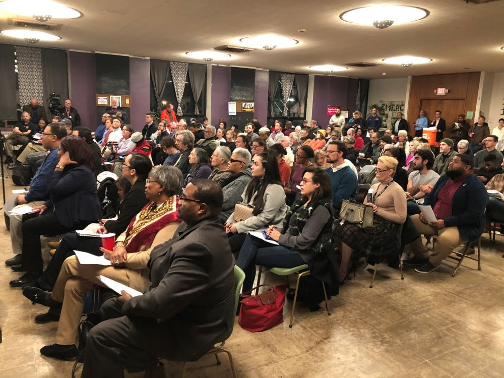 A large room full of people sitting for a public information meeting from EGLE staff.