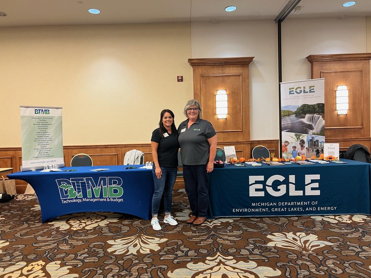Cindy Whittum (r), EGLE’s recruitment and internship specialist, with Marcie Brewer from the Michigan Department of Technology, Management and Budget, at a recruiting event at Oakland University.