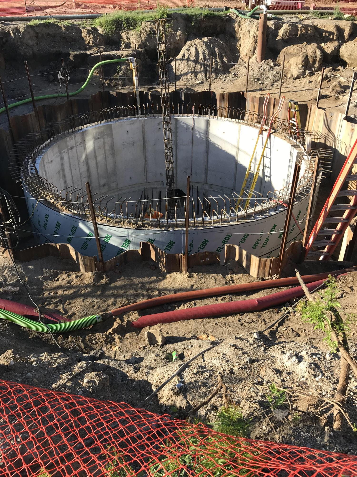 Clean water/Wastewater pipe installation/rehab showing primary clarifier improvements.