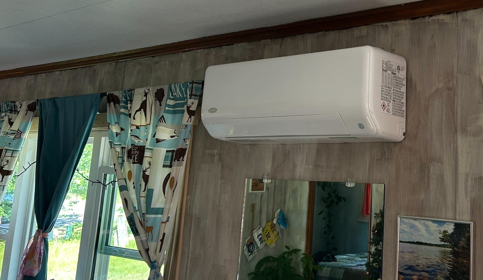 Electric heat pump installed in house