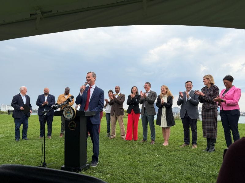 EGLE Director Phil Roos, Michigan U.S. Representative Debbie Dingell, and others with Governor Gretchen Whitmer at the Reclaim the Rivers event on Belle Isle in Detroit.