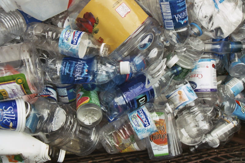 Pile of plastic water bottles ready for recycling. 