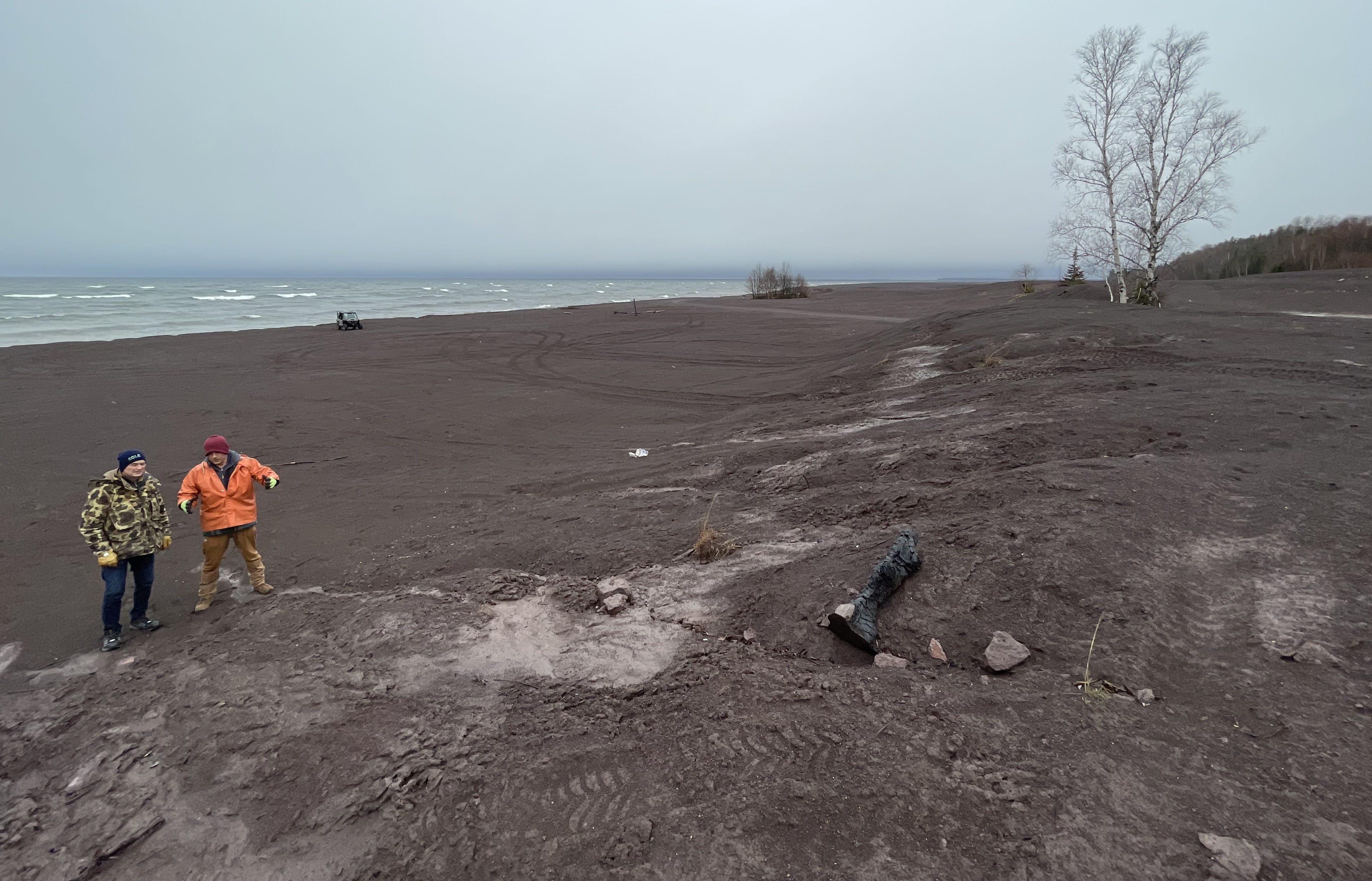 EGLE District Supervisor Jay Parent shows EGLE Director Phil Roos the expanse of mining stamp sands spreading for miles along the Lake Superior shore near the Keweenaw Peninsula village of Gay. 