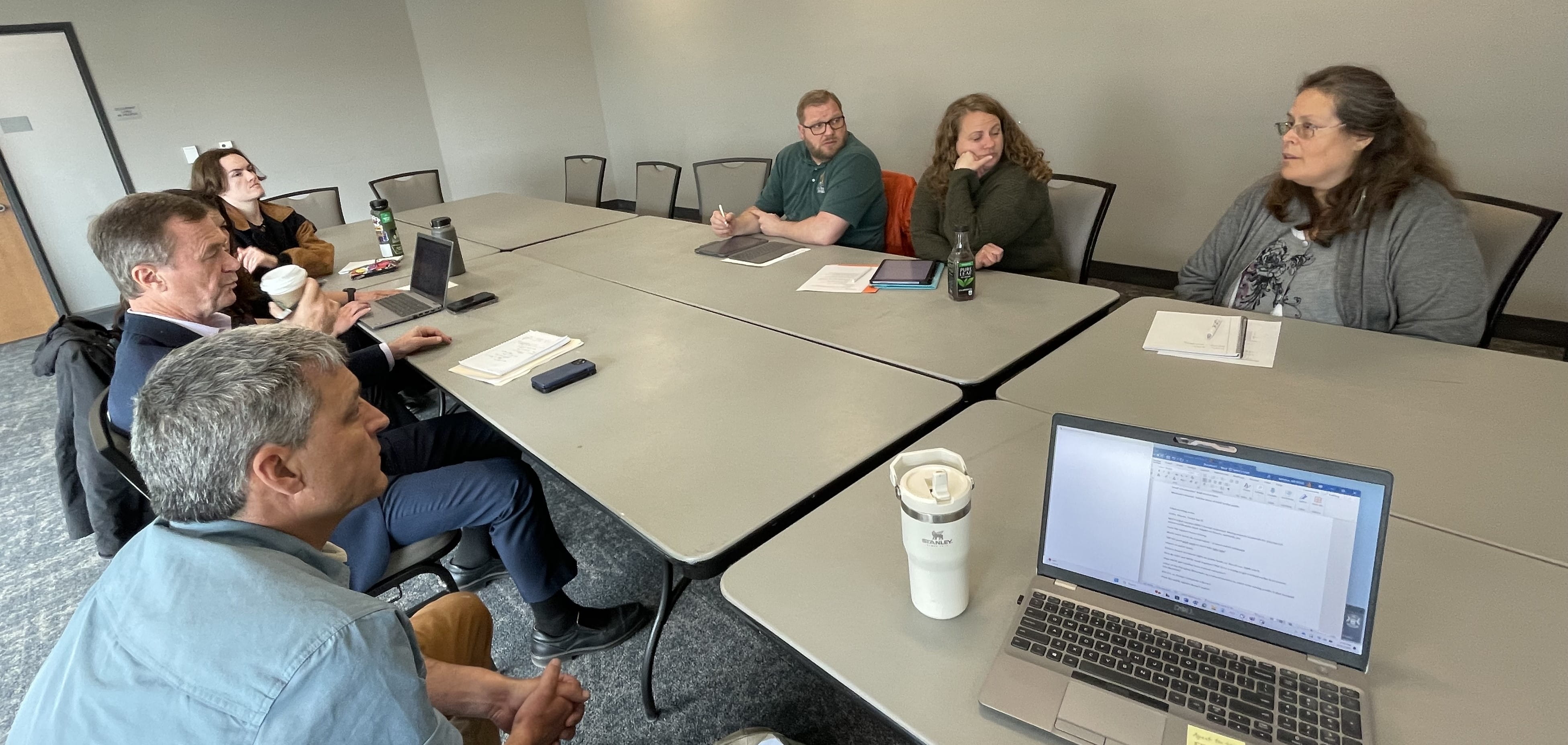 Keweenaw Bay Indian Community (KBIC) Natural Resources Department Director Evelyn Ravindran, right, addresses a meeting with EGLE representatives on the campus of Northern Michigan University. Clockwise from near left are EGLE District Supervisor Jay Parent, Roos, EGLE Environmental Justice and Tribal Liaison Katie Lambeth, KBIC Water Resources Specialist Justin Woodruff, and KBIC Environmental Specialist and Environmental Health Section Lead Dione Price.
