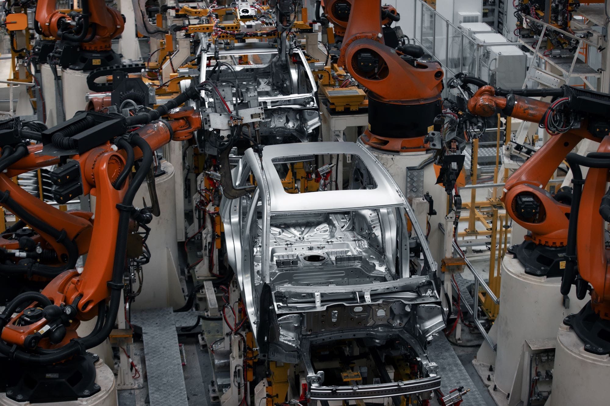 Top view of a robotic welding line in an auto manufacturing plant