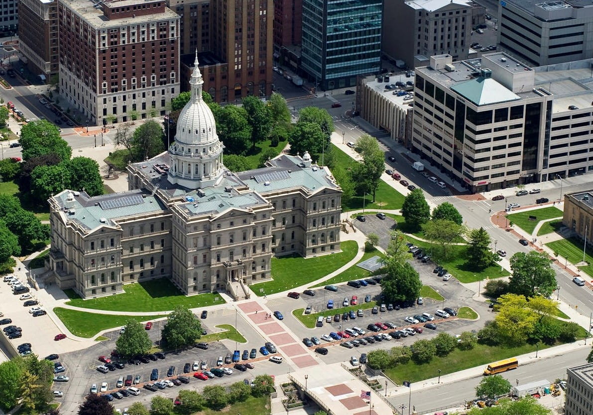 capitol building amid green grass