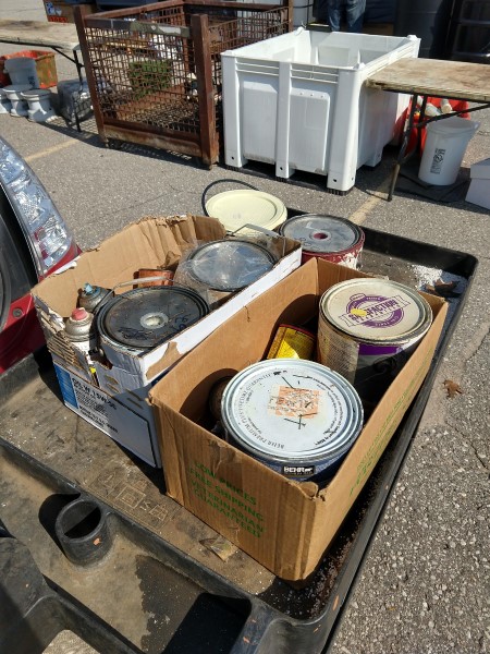 Hazardous waste in box collected at event.
